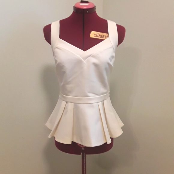 Banana Republic Tops - Banana Republic limited ed peplum sleeveless top